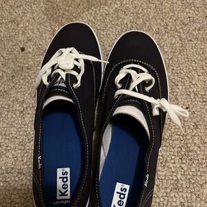 Less sneakers. Brand new. Size 9 ladies.